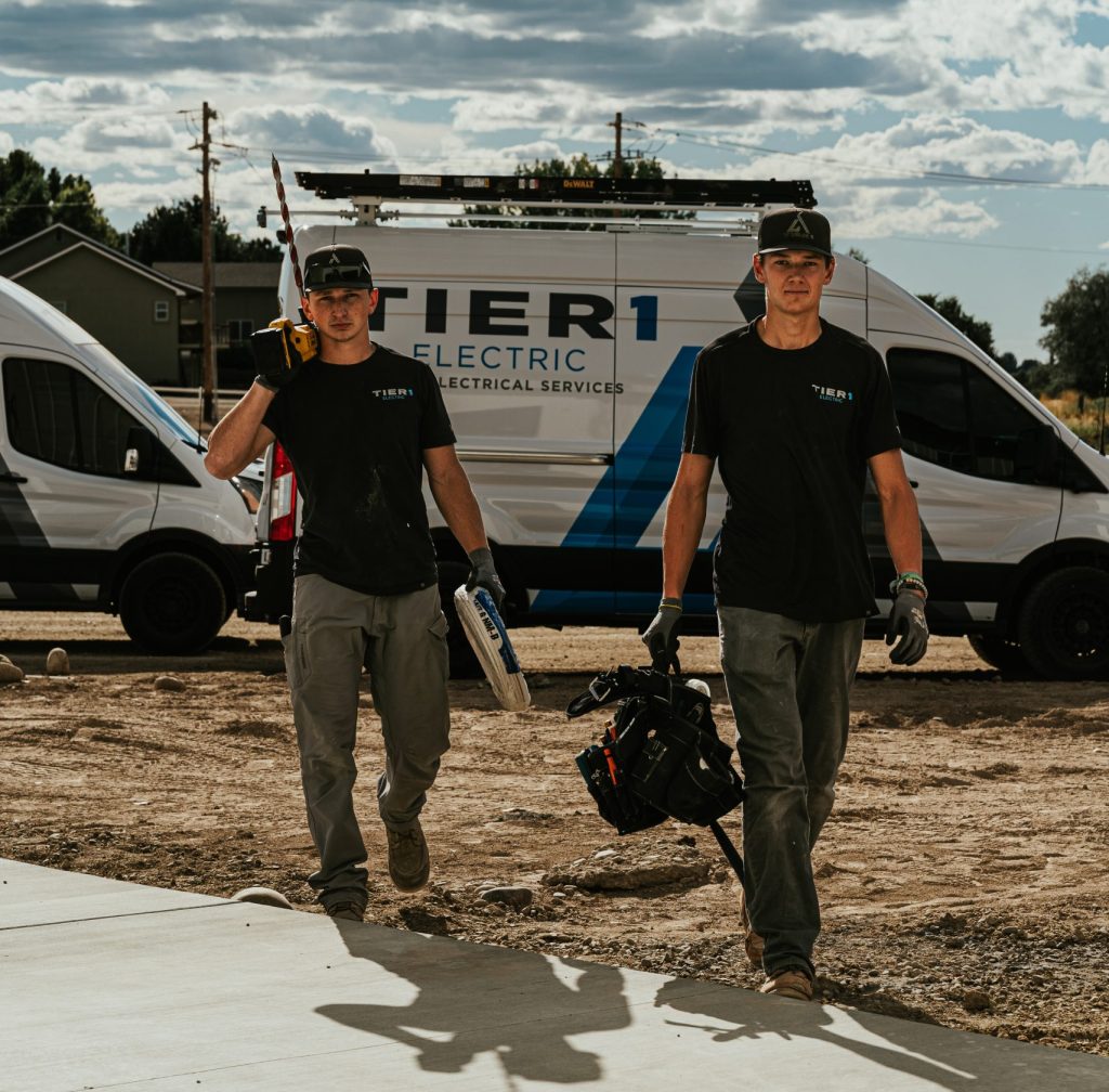 2 member of the team walking with equipment