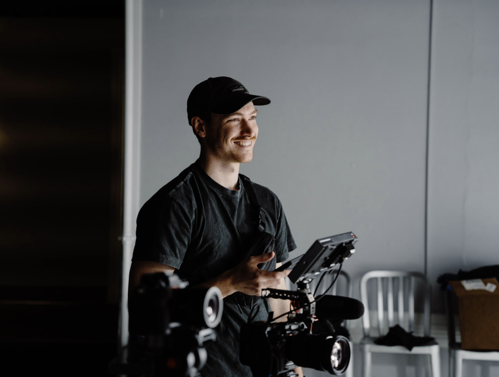 man filming